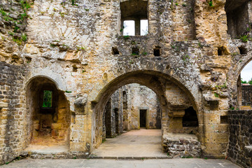 Old castle ruins, ancient stone building facade