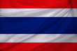 © kittyfly - photo of the beautiful colored national flag of the modern state of Thailand on textured fabric, concept of tourism, emigration, economics and politics, closeup
