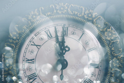 Cuadros en Lienzo Vintage clock pointing 12 o'clock at midnight. New year's eve.