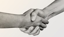 Business Agreement Handshake On White Background
