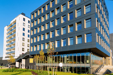 Modern business corporate office building. Blue sky