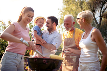 Canvas Print - Family having a barbecue party