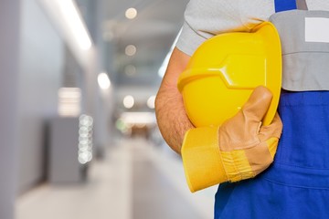 Canvas Print - Worker with a tool belt. Isolated over white background.