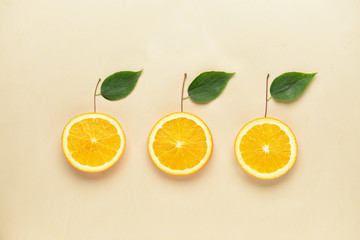 Composition with fresh orange slices on light background