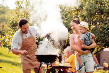 Wall Mural - Family making  barbecue together