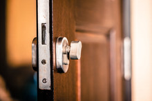 Door Lock Attached To The Wooden Door