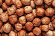Hazelnut background. Peeled hazelnut kernels