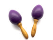 Purple baby rattles isolated on white background. Toy from a tree for children. Musical toy for small children. Maracas