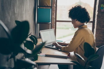 Sticker - Profile side back rear spine view photo of cool smart afro american girl promoter sit table use laptop work with funds charts search start-up news in office loft workstation