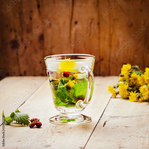 Fototapeta na drzwi i meble Herbal tea with rose hip, nettle and dandelion