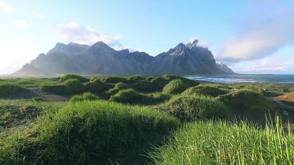 Wall Mural - Amazing view of unique green hills. Location Stokksnes cape, Vestrahorn, Iceland, Europe.