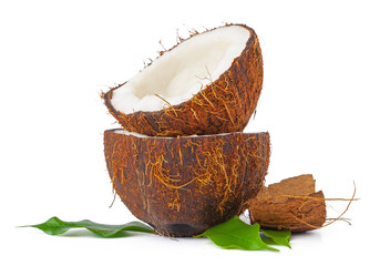 Wall Mural - Cracked coconut with leaves isolated on white background