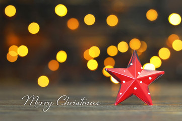  Christmas card with Christmas star ornament and blurred Christmas lights in background