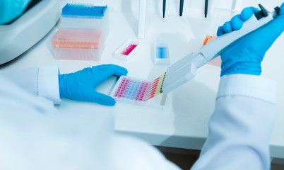 Aufkleber - Woman medical assistant working with colored samples