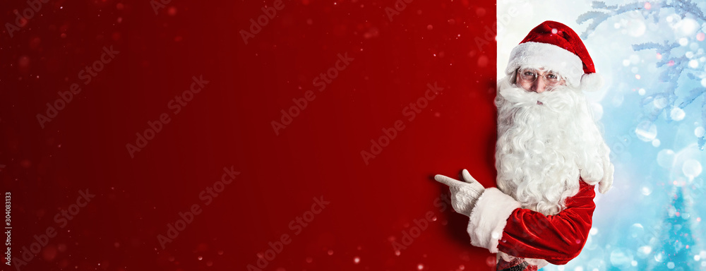 Santa Claus Holding Blank Advertisement Banner Red Background with Copy Space - obrazy, fototapety, plakaty 
