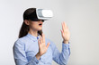 © Prostock-studio - Amazed Business Lady In Virtual Reality Headset Standing In Studio