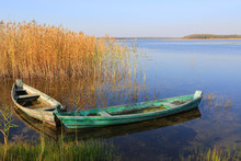 Wooden Boats On Lake Water