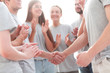 © ASDF - handshake of members of the contact group, to applause