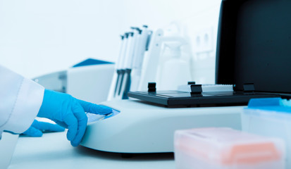 Poster - Woman using Medical equipment for scientific researches