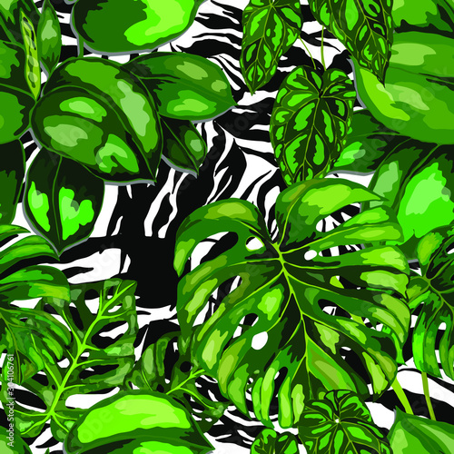 Seamless pattern with tropical leaves on zebra stripes. Beautiful allover pri...