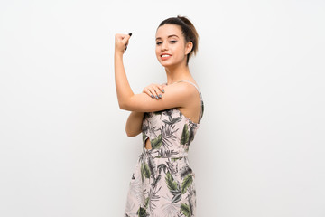 Wall Mural - Young woman over isolated white background doing strong gesture