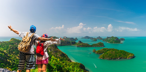 Wall Mural - Panorama couple traveler on top of Ang Thong island joy fun view beautiful nature scenic landscape, Adventure lifestyle tourist travel Samui Thailand summer holiday vacation, Tourism destinations Asia