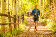 © Tandem Stock - Telluride, Colorado, USA: A male runner jogging along a trail on a sunny autumn day.