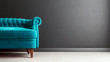 Living room dark grey interior wall mock up with turquoise blue colored velvet sofa, empty grey wall with free space on the right, 3D render, 3D illustration