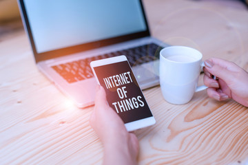 Poster - Writing note showing Internet Of Things. Business concept for connection of Devices to the Net to Send Receive Data woman with laptop smartphone and office supplies technology