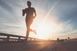 © sutadimages - Athlete runner feet running on road, Jogging at outdoors. Man running for exercise.Sports and healthy lifestyle concept.