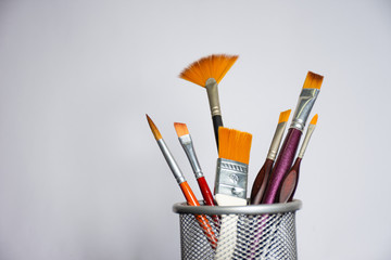 brushes in jar