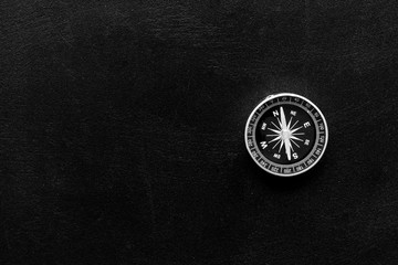 Wall Mural - Compass - small and stylish - on black background top view copy space