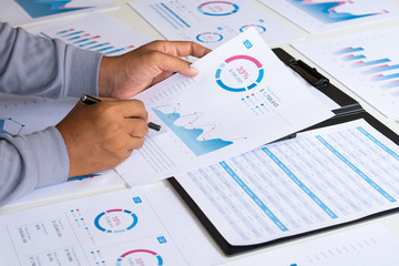 Poster - businessman working calculate data document graph chart report marketing research development  planning management strategy analysis financial accounting. Business office concept.