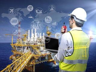 Wall Mural - Industrail offshore oil and gas rig platform in the gulf of Thailand and physical system icons concept, Industry 4.0 concept.