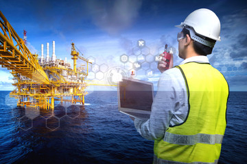 Wall Mural - Industrail offshore oil and gas rig platform in the gulf of Thailand and physical system icons concept, Industry 4.0 concept.