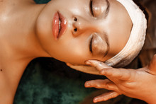 Close Up Of A Beautiful Woman Doing Facial Procedures With Hyaluronic Acid In A Spa Salon.