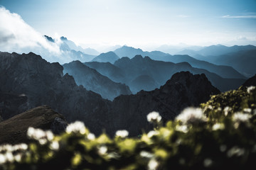 View on the mountains covered in fog from Mangart Pass that connect's Italian and Slovenian side, Mangart pass