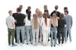 © ASDF - rear view. group of young people standing in front of blank screen