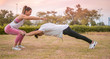 © Bojan - Handstand training. Athletic man doing a balancing handstand exercise together with female yoga partner