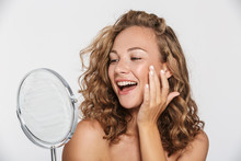 Image Of Excited Half-naked Woman Smiling And Looking At Mirror
