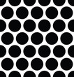 © pyty - Seamless polka dot pattern in triangular arrangement. Black dots on white background. Vector illustration