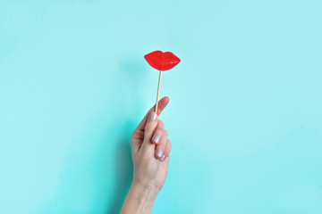 Hand holding Red Lollipop