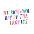 © AllBeau - International Day of the Tropics, 29th June. Arty handwritten sign, colorful letters in ink, paintbrush. Vibrant multicolored lettering, tropical style to celebrate the Tropics, yellow, red, green