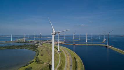 Wind turbine from aerial view, Drone view at windpark krammersluizen a windmill farm in the lake grevelingen in the Netherlands,Sustainable development, renewable energy