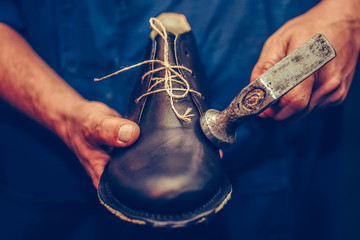 Shoemaker making comfortable hand made shoes for people