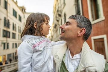 Poster - Father with little daughter looking each other with love in Venice, Italy