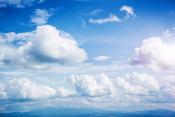 Naklejka na meble Fantastic view of the azure sky on a sunny day with fluffy clouds.