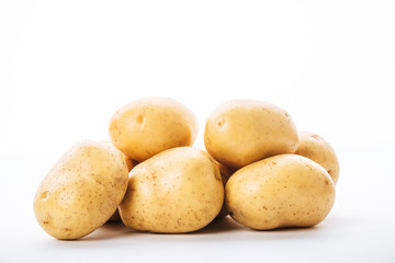 organic raw potatoes on white background