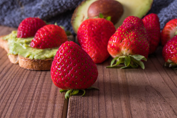 Sticker - fresh natural red strawberries on wooden background