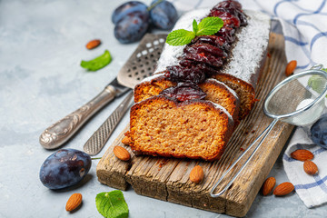 Wall Mural - Homemade plum cake with almonds and spicy plum.